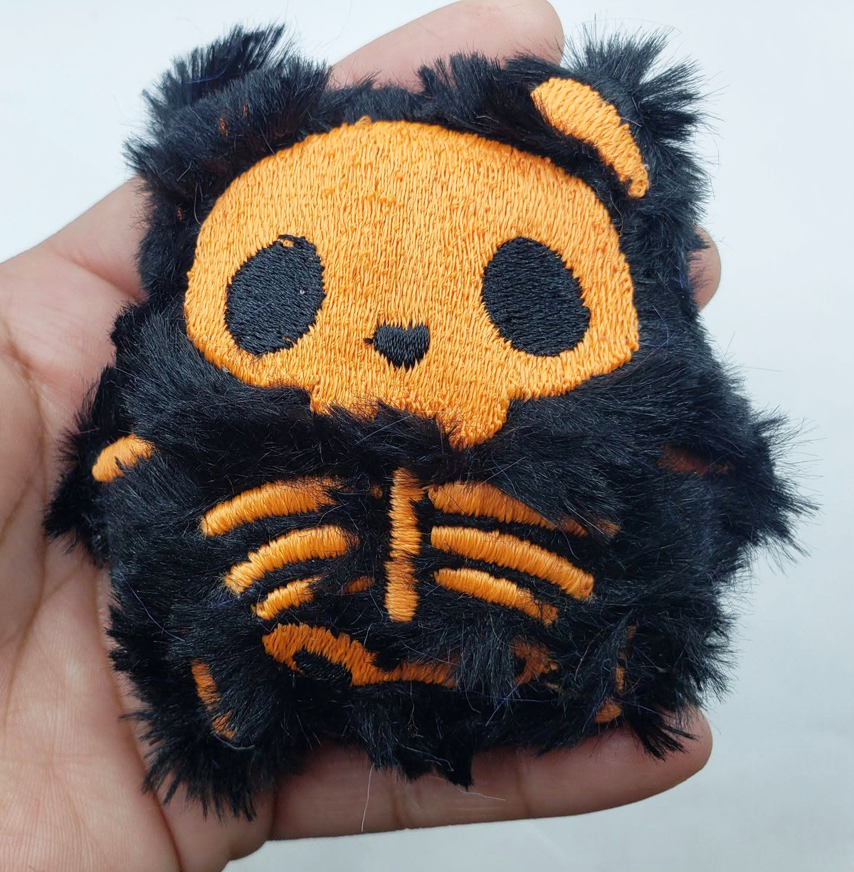 Black on Orange Skelecat Plush - Glow In The Dark
